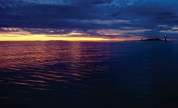 Solnedgång Vänern. Foto: Björn Kinsten.